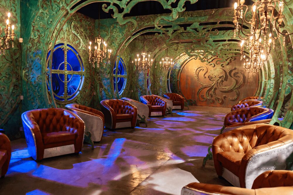 Lost Spirits fantasy room underwater room with leather chairs, ornate walls, etc in Las Vegas